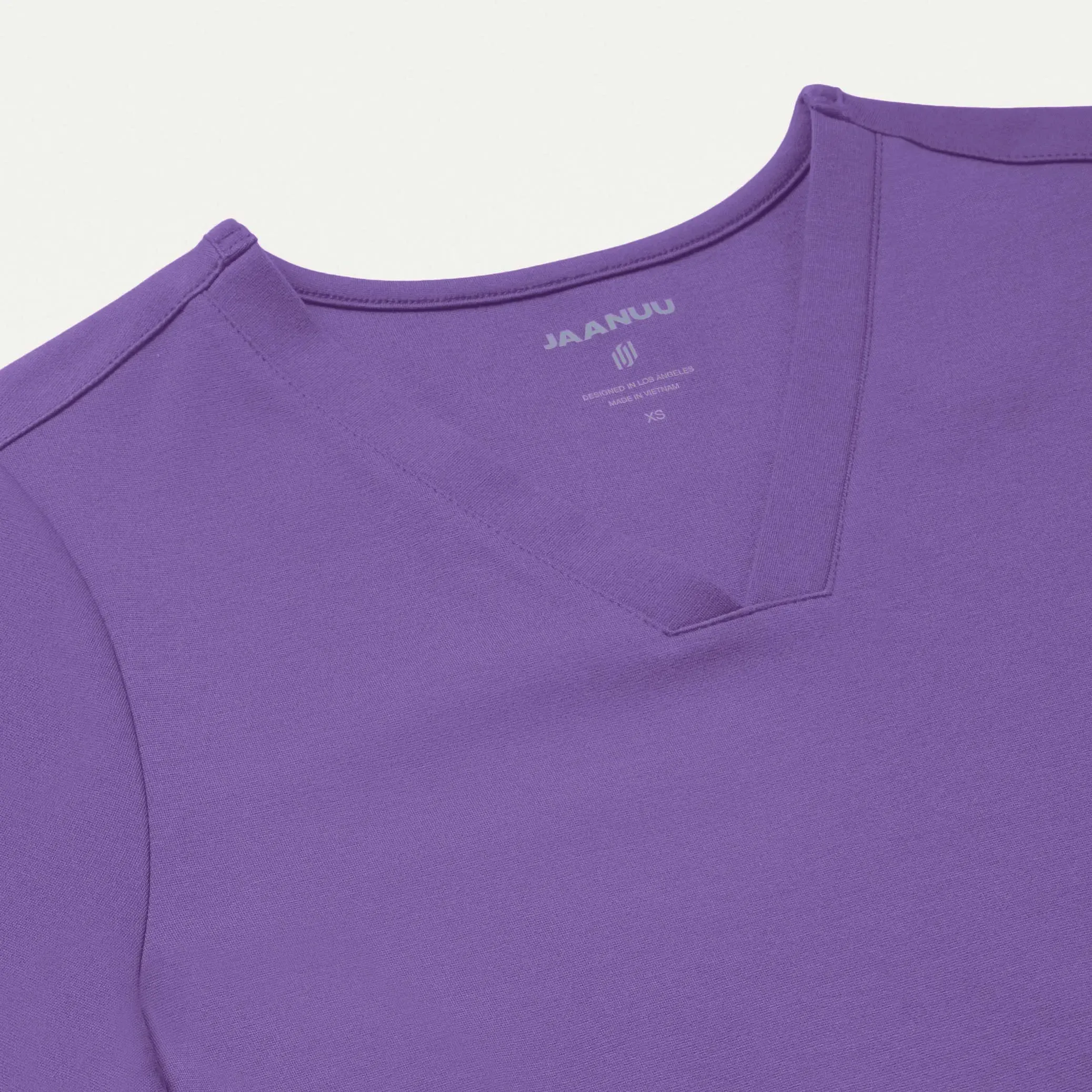 Jaanuu Women's Cesi Slim ULTRAsoft Scrub Top - Violet